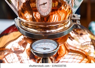 The Thermometer On A Copper Pot For Distillation Of Alcohol