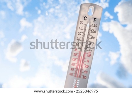 Thermometer in the snow with sub zero minus temperature background concept for winter