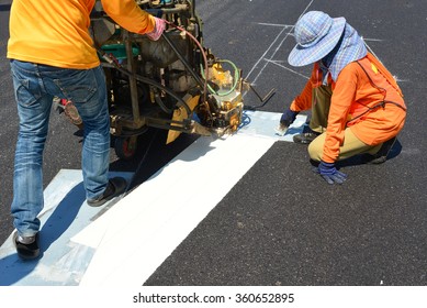 Thermoplastic Spray Marking Machine During Road Construction Work