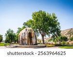 Thermopolis WY USA - August 22, 2017: Originally built to vent steam from hot springs piped through the park, the original teepee shape is now layered in a mound of mineral deposits.