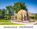 Thermopolis WY USA - August 22, 2017: Originally built to vent steam from hot springs piped through the park, the original teepee shape is now layered in a mound of mineral deposits.