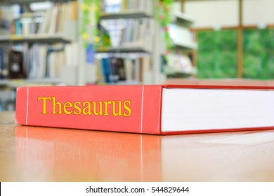  Thesaurus textbook, book on wood table, blur abstract campus school library background, stack of special knowledge resource, educational data aisle - Shutterstock ID 544829644