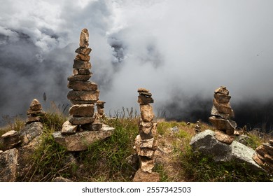 These apachetas, stone cairns built by trekkers, honor the Pachamama (Mother Earth). Each stone represents a moment, a wish, or a blessing left behind on the journey to Choquequirao - Powered by Shutterstock