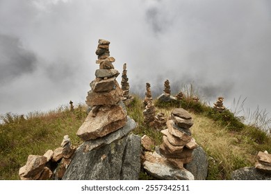 These apachetas, stone cairns built by trekkers, honor the Pachamama (Mother Earth). Each stone represents a moment, a wish, or a blessing left behind on the journey to Choquequirao - Powered by Shutterstock