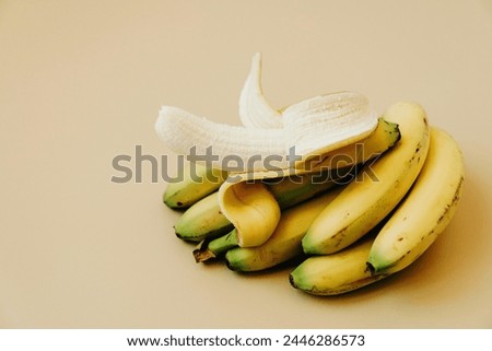 These are bananas and a banana peel is removed