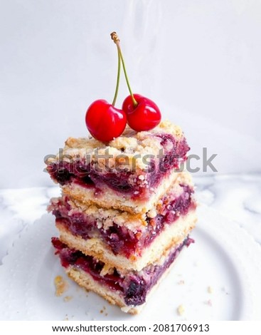 Similar – slices of a pie with cherries