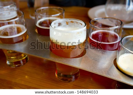 These craft microbrew beers are in a sampler tray at a brewery in Oregon.