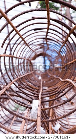 These structures, known as column reinforcement or armature, are pre-assembled for concrete pillars in new building construction
