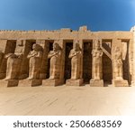 These towering columns of the Temple of Ramses III at Karnak, seem to reach the heavens. Designed to connect the earthly realm with the divine, symbolizing the power and majesty of the Egyptian gods.