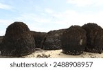 These are volcanic rocks the remnants that are displayed beautifully for travelers to come and be fascinated by the traces of volcanic eruptions in the areas of Kam Island, Trat province in Thailand.