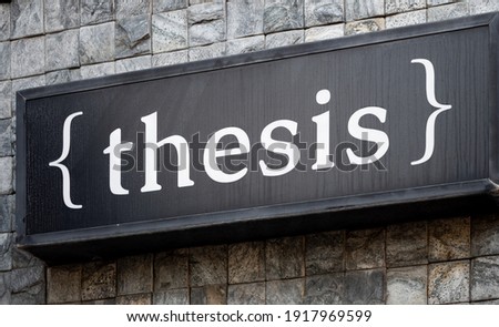 Thesis statement. wall with text thesis. Thesis sign. Text thesis on the wall
