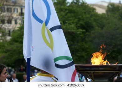 Thessaloniki, Greece - April 23, 2016: The Olympic Flame and the flags of the Olympics, Brazil and Greece. Arrival of the Olympic Flame of XXXI Summer Olympic Games Rio 2016  in Thessaloniki