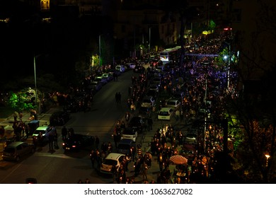 Thessaloniki, Greece - April 8 2018: Crowd Holding Candles At Night On Resurrection Sunday, Called Pascha. People On The Streets During Greek Orthodox Easter, Celebrating The Resurrection Of Jesus.