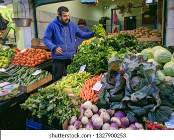 Thessaloniki, Greece -January 24, 2019: Male  Stall Holder At Farmers Fresh Food Market Of Thessaloniki