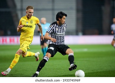 Thessaloniki, Greece March 7, 2021 : Player Of Paok Shinji Kagawa (R) In Action During The Greek Superleague Game Between PAOK Vs ARIS At Toumba Stadium