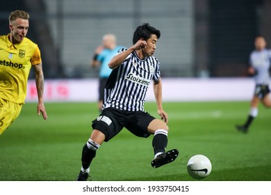 Thessaloniki, Greece March 7, 2021 : Player Of Paok Shinji Kagawa (R) In Action During The Greek Superleague Game Between PAOK Vs ARIS At Toumba Stadium