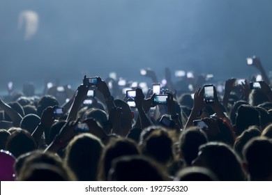 THESSALONIKI, GREECE, MAY 8 2014:People Taking Photographs With Touch Smart Phone During A Music Concert Live On Stage For The Ace Of Heart Tour At Sports Arena In Thessaloniki.