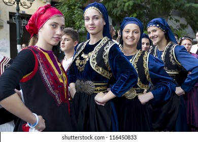 THESSALONIKI, GREECE - OCT 14:Greek folklore dancers - street parade during the event of "celebrating 100 years since the liberation of Thessaloniki" on October 14, 2012 in Thessaloniki,Greece.