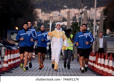 Thessaloniki, Greece - October 27, 2017. A Greek Athlete Carries The Olympic Flame Of Pyeongchang 2018 Winter Olympics, After Its Arrival In The City.
