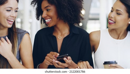 They Can't Wait To Get Started. Cropped Shot Of Three Young Beautiful Businesswomen Walking Through A Modern Office.