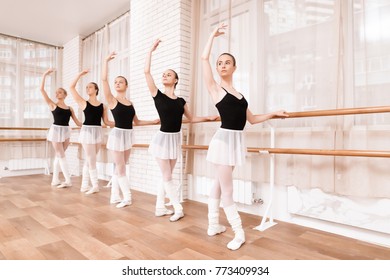 They train dance moves. They use ballet barre. They are professional theater actors.