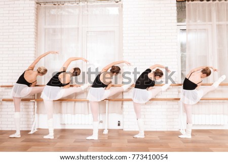 They are training the stretching. They use ballet barre. They are professional theater actors.