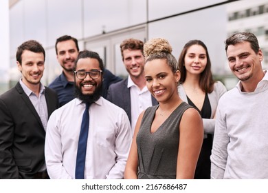 Theyre An Ambitious Bunch. Portrait Of A Group Of Businesspeople Standing Outside An Office.