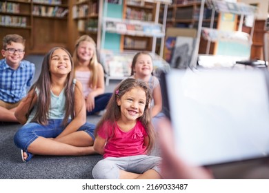 Theyre Eager For Knowledge. Shot Of A Group Of Young Children Having A Lesson At School.