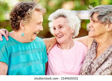 Theyre like sisters. Shot of a group of smiling senior women standing outside.