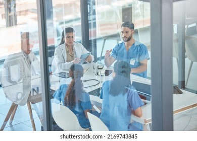 Theyre in a private and confidential session. Shot of a team of medical staff having a meeting. - Shutterstock ID 2169743845