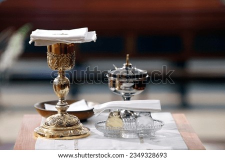 Thi Nghe catholic Church. Catholic church. Sunday mass. Eucharist table with Chalice and ciborium. Cruseilles. France.