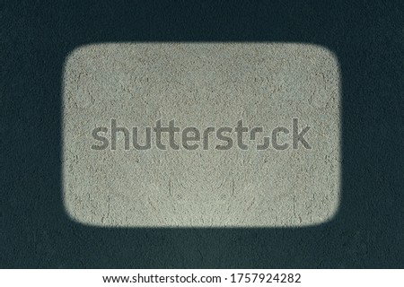 Thick black rectangular frame with a gray background. Space for text. Texture wall.