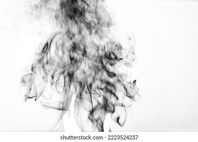 Thick Black Smoke On A White Isolated Background