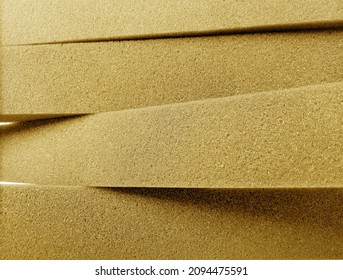 Thick Brown Sponge Foam. Soft Textured And Breathable Industrial Material. Stack Of Rectangles