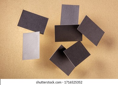 Thick Business Cards, Flying On A Brown Background, A Mockup For Design Presentation