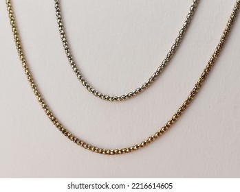 Thick Chunky Chain Necklace On A Beige Background, Old Gold Vintage Jewelry