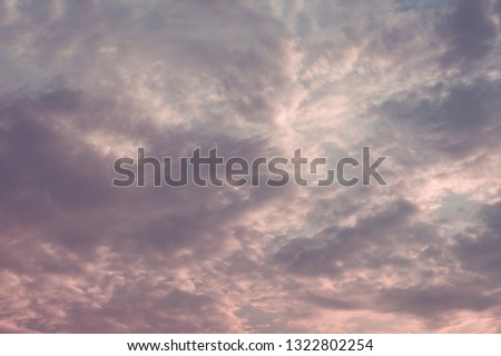 A thick cloud of gray overcast in the sky before a rainstorm coming.