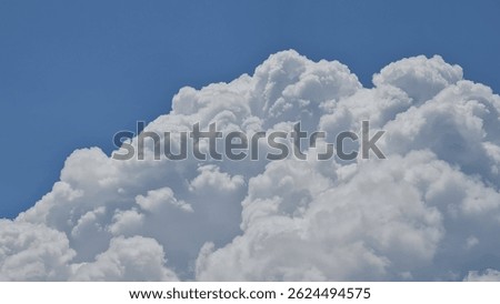 Thick clouds in the blue sky
