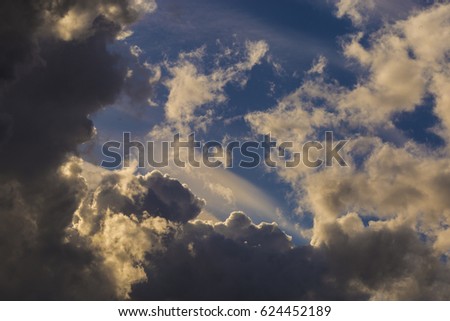thick clouds just before sunset