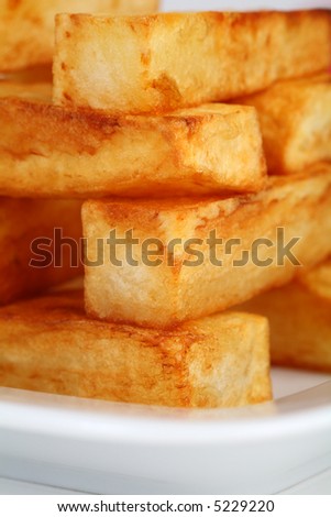 Thick cut golden chips stack like building blocks