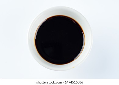 Thick Dark Soy Sauce In A Bowl On A Light Background