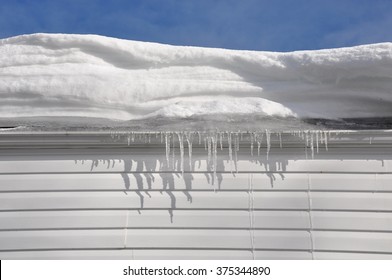 Thick Layers Of Snow On The Roof