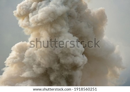 Thick smoke caused by heavy combustion.