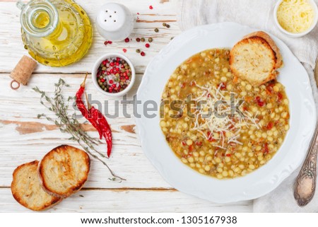 Similar – Image, Stock Photo Red organic lentils on a blackboard