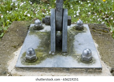 Thick Steel Plate With Big Screws And Hinge/fixation Of An Awning/steel Plate On Concrete Block