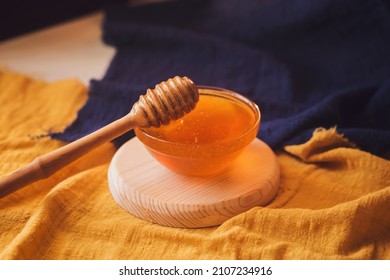 Thick Sweet Tasty Honey In A Bowl. Wooden Spoon For Honey. Sugar Substitute. Natural Sweetness.