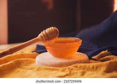 Thick Sweet Tasty Honey In A Bowl. Wooden Spoon For Honey. Sugar Substitute. Natural Sweetness.