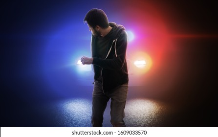 Thief is escaping and running away from police car at night. - Powered by Shutterstock