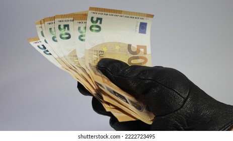 The Thief Hand Steals Money. Stealing Money From Purse. 