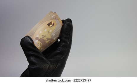 The Thief Hand Steals Money. Stealing Money From Purse. 